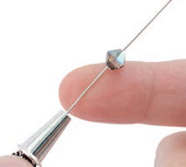 Bead getting threaded on